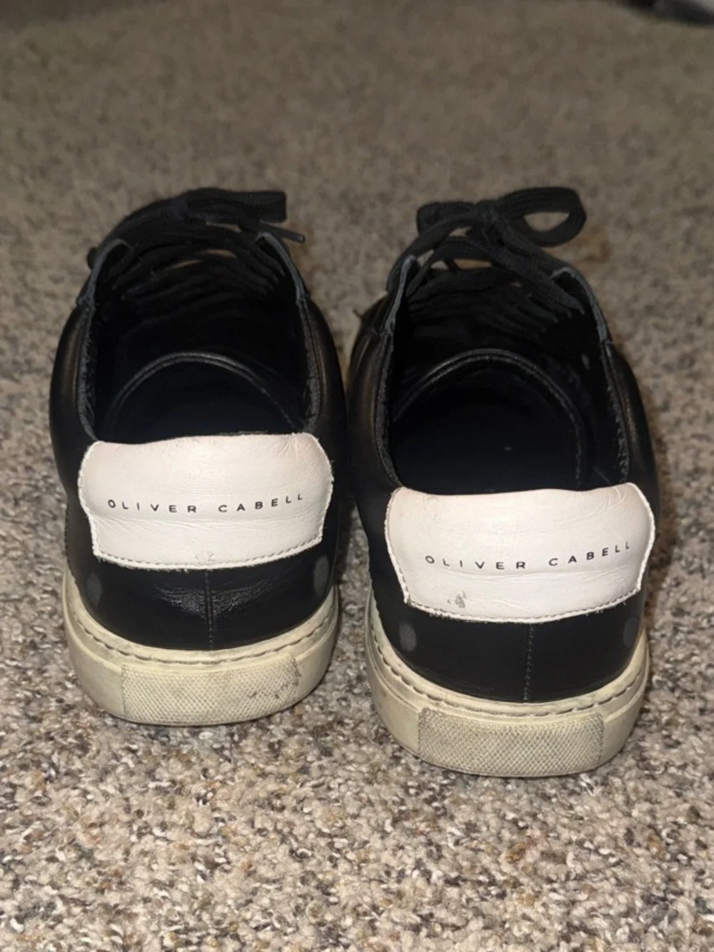 Oliver Cabell Black Leather Low-Top Sneakers with White Circle Accent